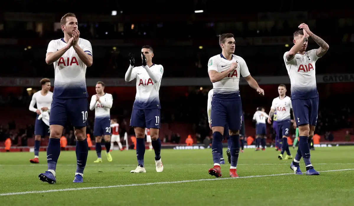 Tottenham players celebrate win over Arsenal
