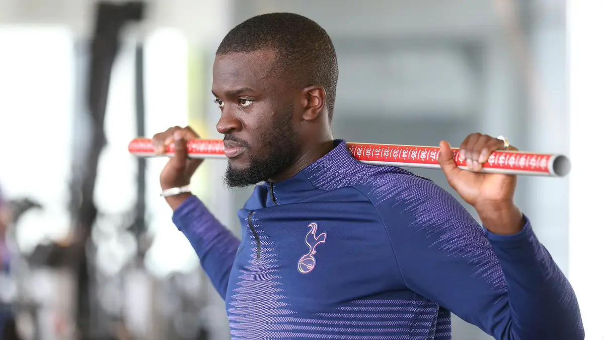 Tanguy Ndombele pumping iron in the gym.