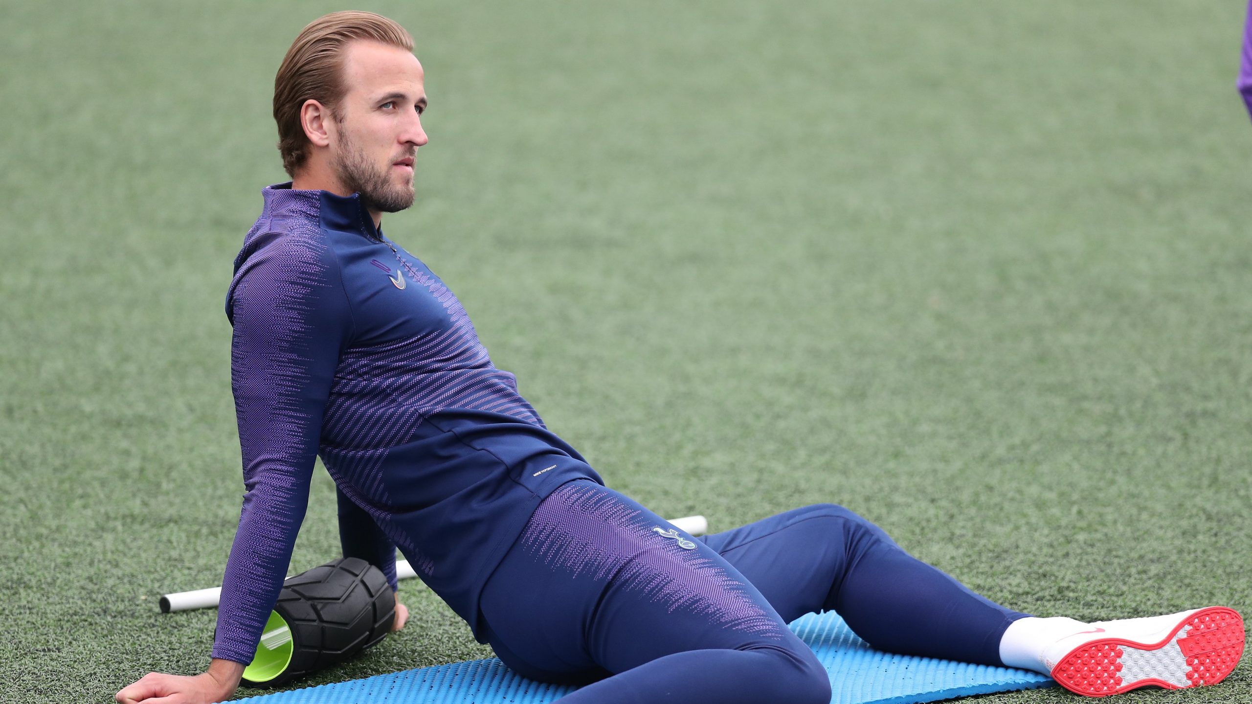 Harry Kane stretches in training