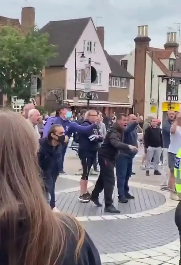 One of the counter protestors was seen donning a Tottenham training top