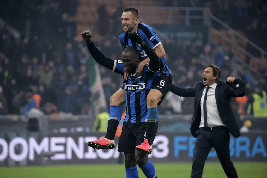 Stefan de Vrij celebrates with Romelu Lukaku and Antonio Conte at Inter Milan.