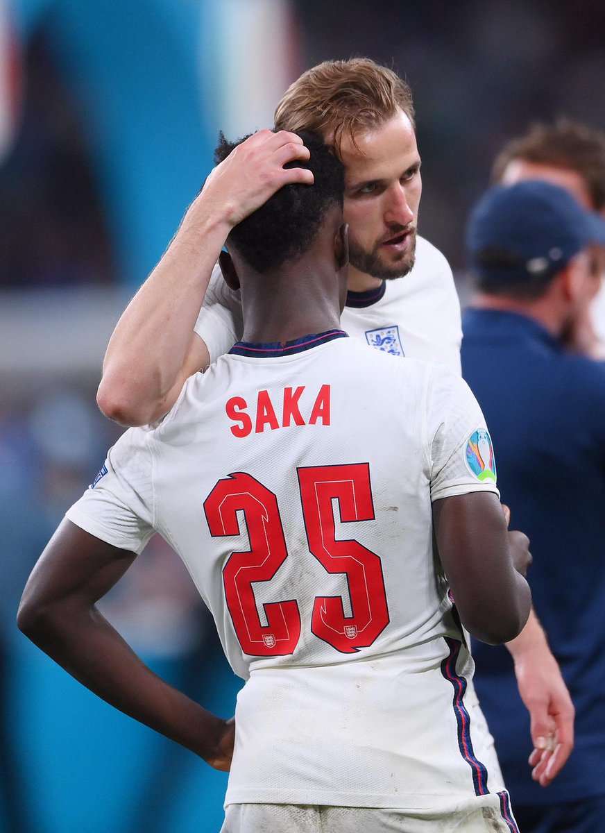 Bukayo Saka and Harry Kane after England's defeat to Italy.