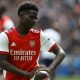 Bukayo Saka believes Arsenal are motivated by having to compete with Tottenham Hotspur for a top-four finish.