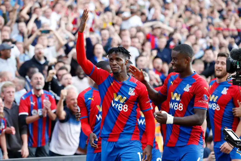Wilfried Zaha celebrates scoring a goal for Crystal Palace.