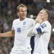 England s Harry Kane rushes in to congratulate team mate Wayne Rooney after he scored the goal that broke the England goals record