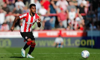 Rico Henry with the ball. (Credit: Brentford official website)