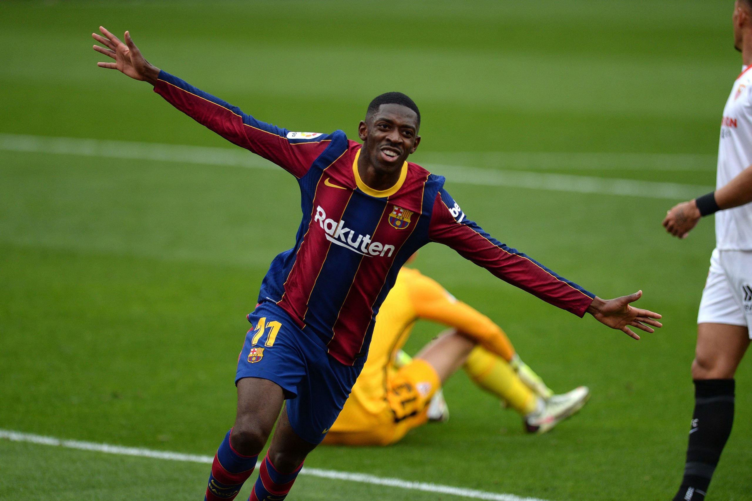 Barcelona's French forward Ousmane Dembele celebrates after scoring a goal (Photo by CRISTINA QUICLER / AFP) (Photo by CRISTINA QUICLER/AFP via Getty Images)