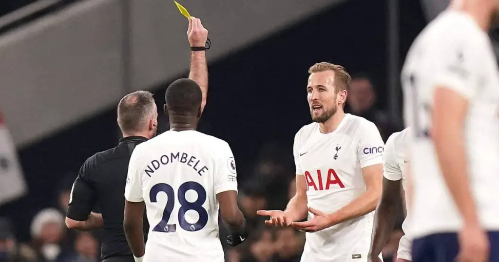 Harry Kane was given a yellow card for a strong challenge on Andy Robertson.