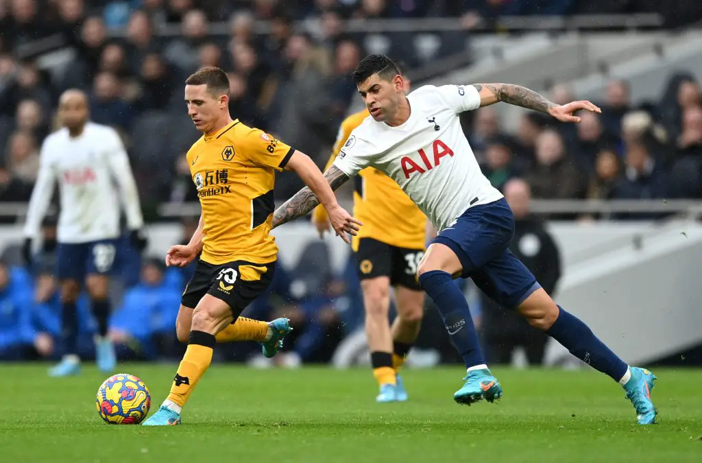 Tottenham Hotspur defender Cristian Romero attempting to win the ball against the Wolves.