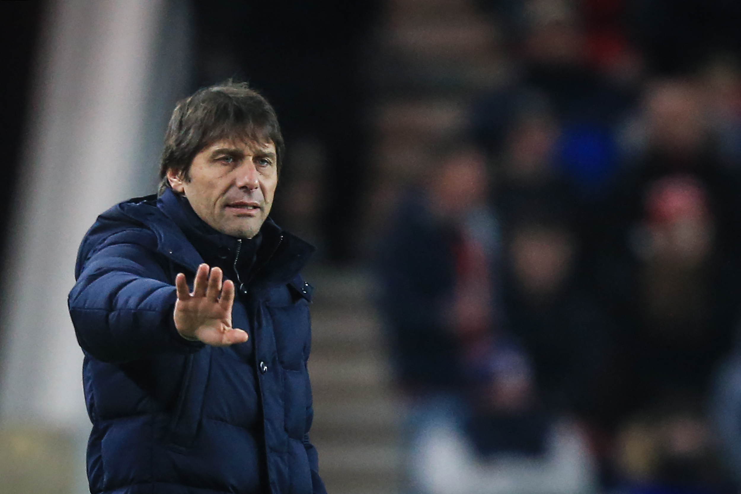 Antonio Conte reacts on the sidelines. (Photo by LINDSEY PARNABY/AFP via Getty Images)