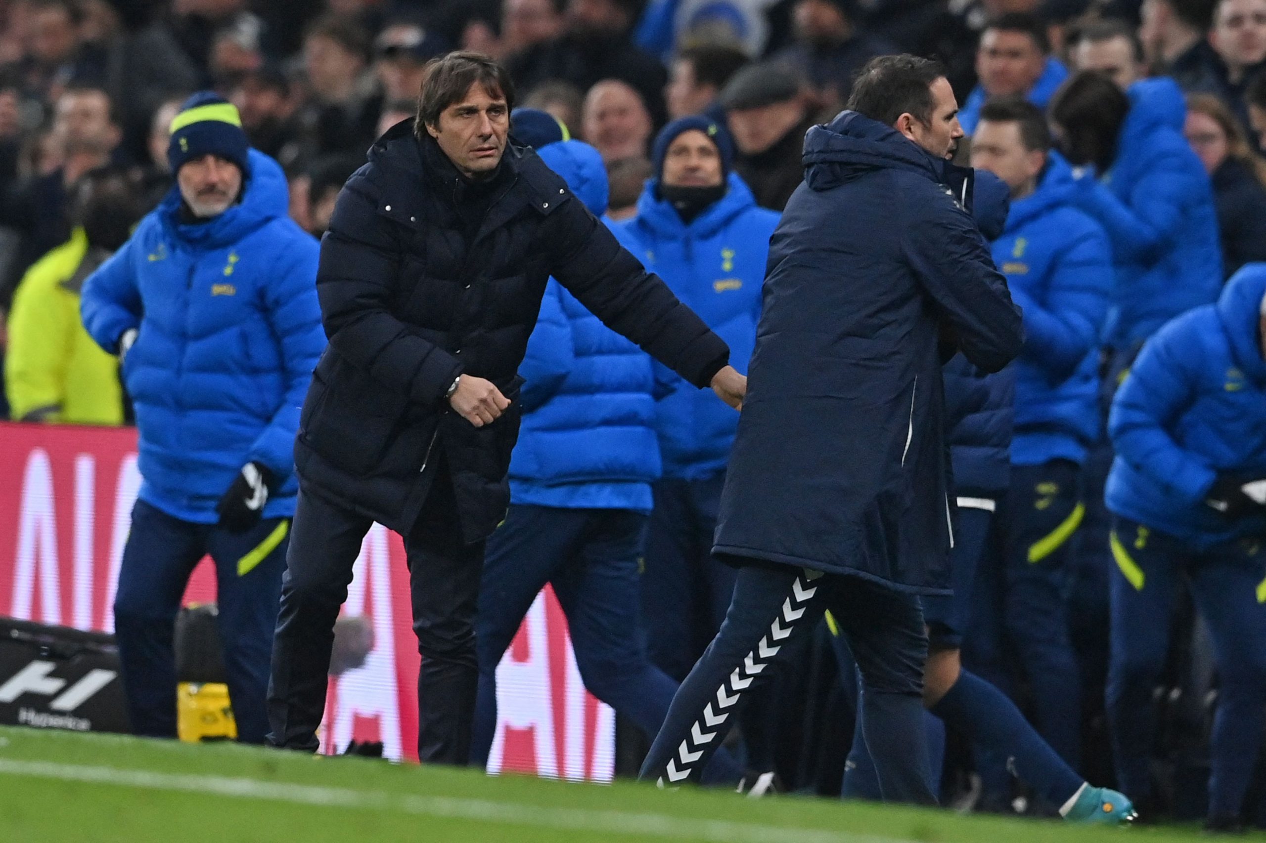 Tottenham Hotspur manager Antonio Conte says finishing in the top four would be like winning a trophy.