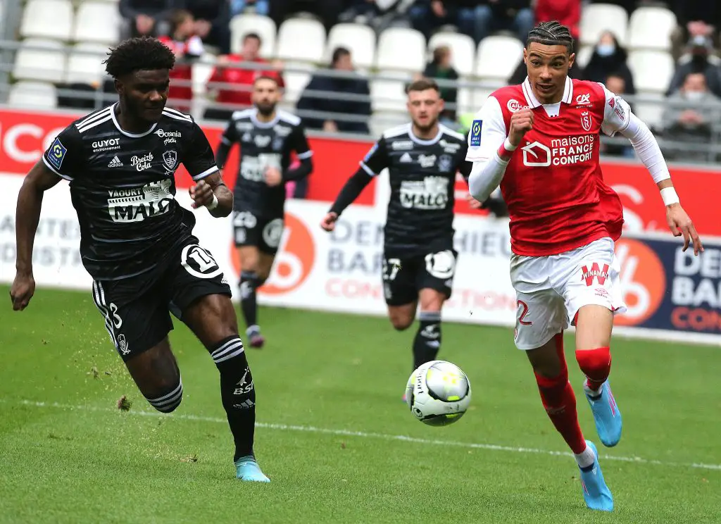 Tottenham Hotspur identify Reims striker Hugo Ekitike as transfer target amidst Barcelona interest.  (Photo by FRANCOIS NASCIMBENI/AFP via Getty Images)