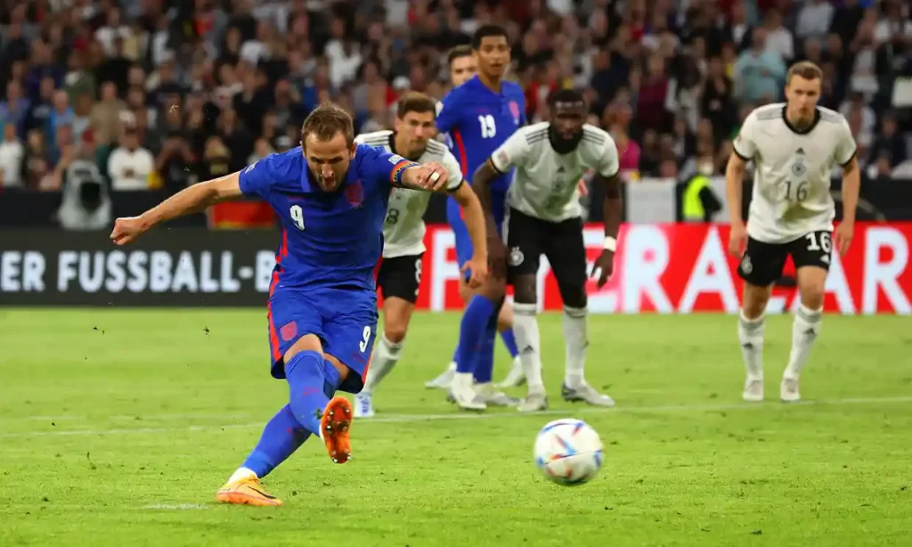 Tottenham striker Harry Kane celebrates 50th England goal.