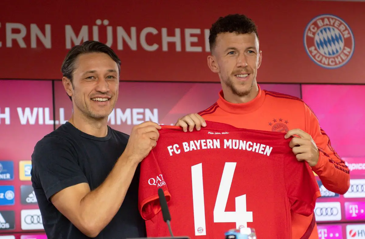 Ivan Perisic poses with the number 14 Bayern Munich shirt. (Photo DANIEL KOPATSCH/AFP via Getty Images)