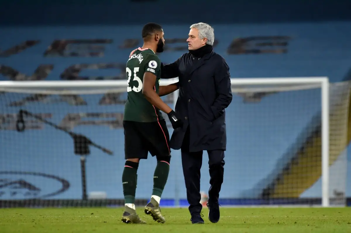 Jose Mourinho, of Tottenham Hotspur embraces Japhet Tanganga after a game against Manchester City.