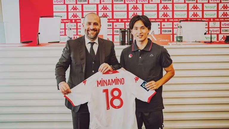 Paul Mitchell with AS Monaco's Takumi Minamino. (Image: Sky Sports)