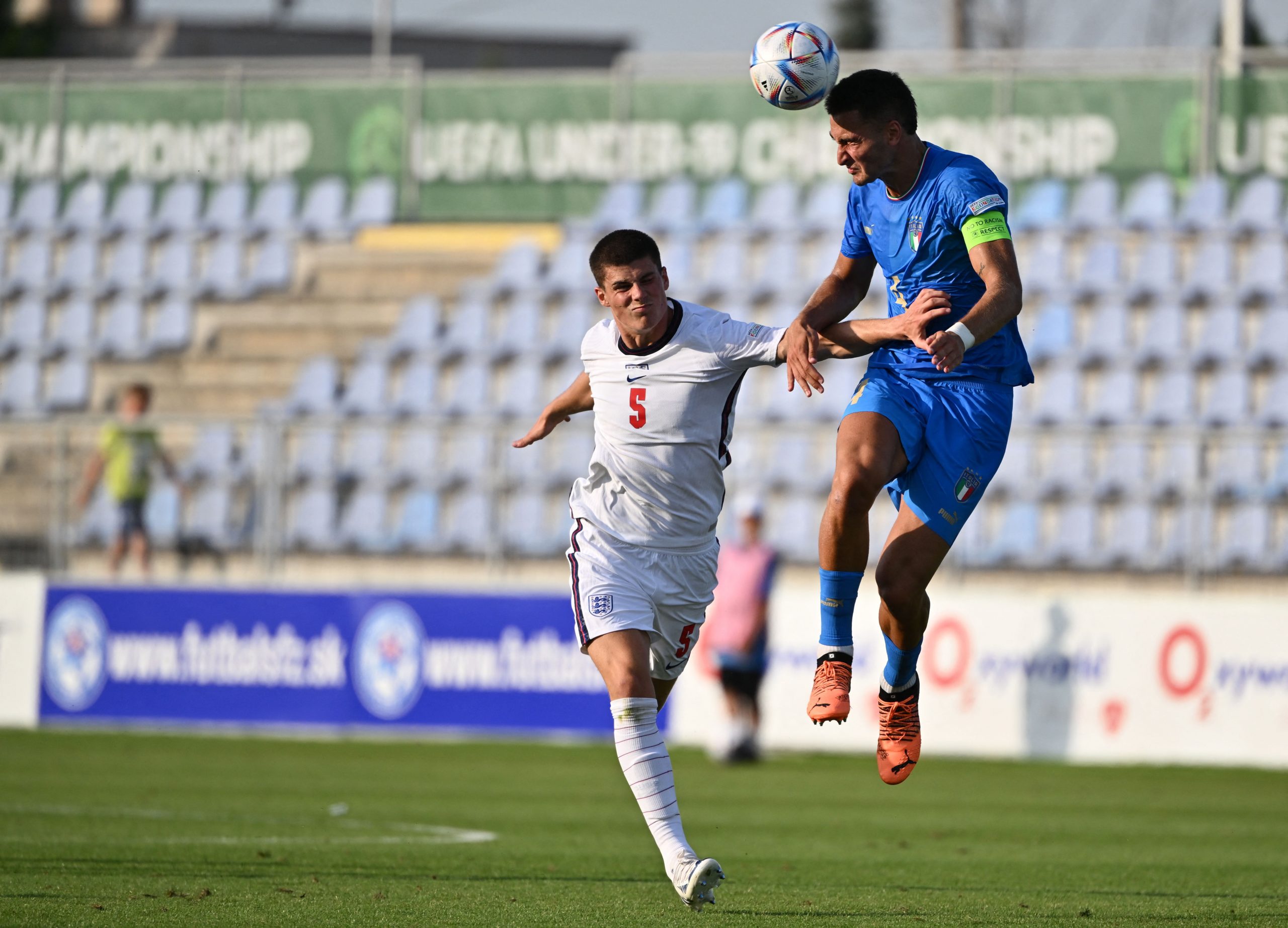Italy's defender Diego Coppola (R) and England's defender Ronnie Edwards vie during the UEFA Under-19 European Championship semi-final.