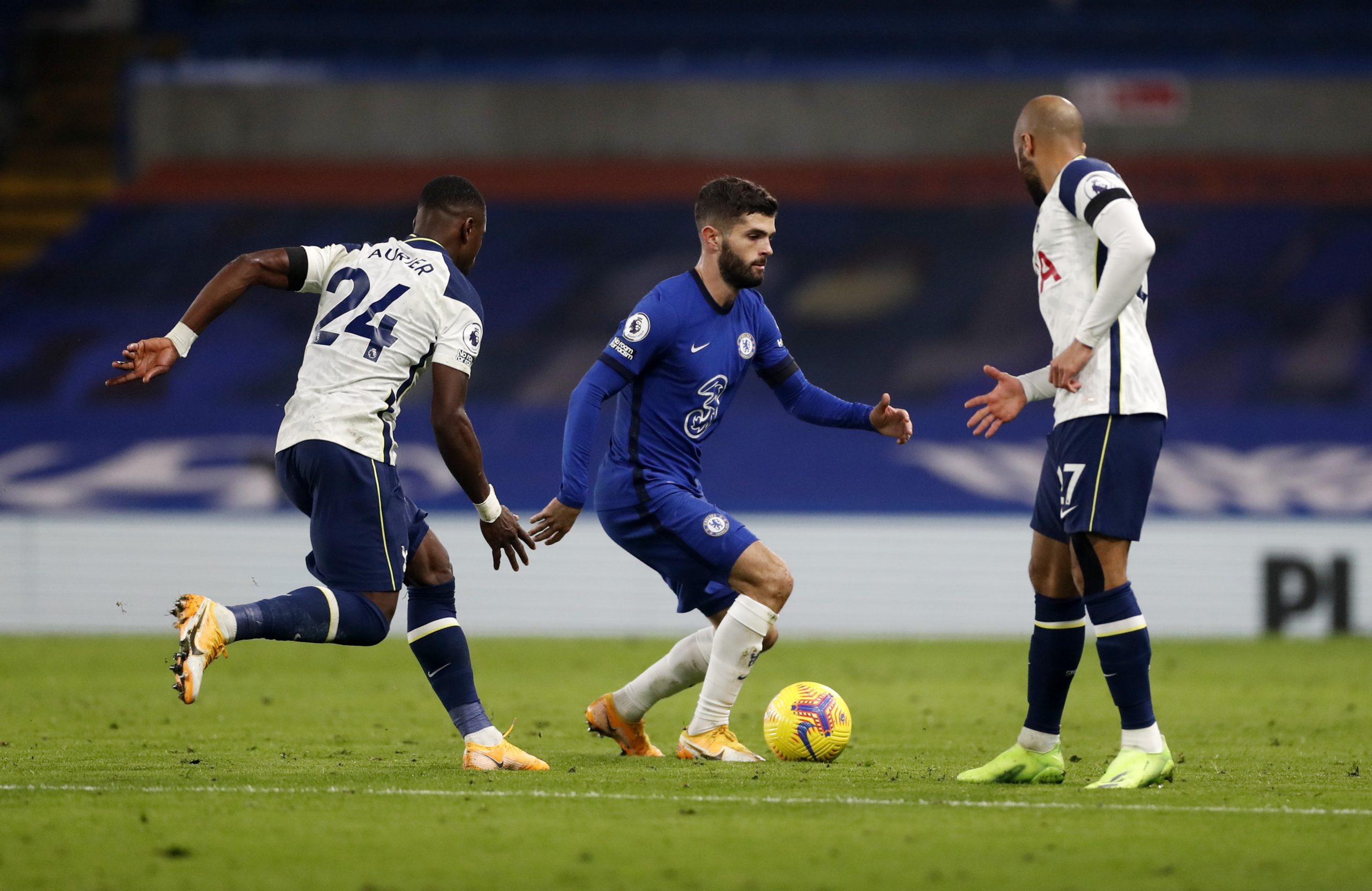 Christian Pulisic of Chelsea is closed down by Serge Aurier and Lucas Moura of Tottenham Hotspur.