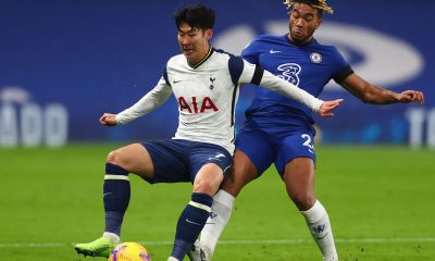 Reece James (R) closes in on Tottenham Hotspur's Son Heung-Min.