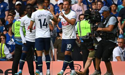 Harry Kane of Tottenham Hotspur celebrates with Ivan Perisic after scoring against Chelsea.