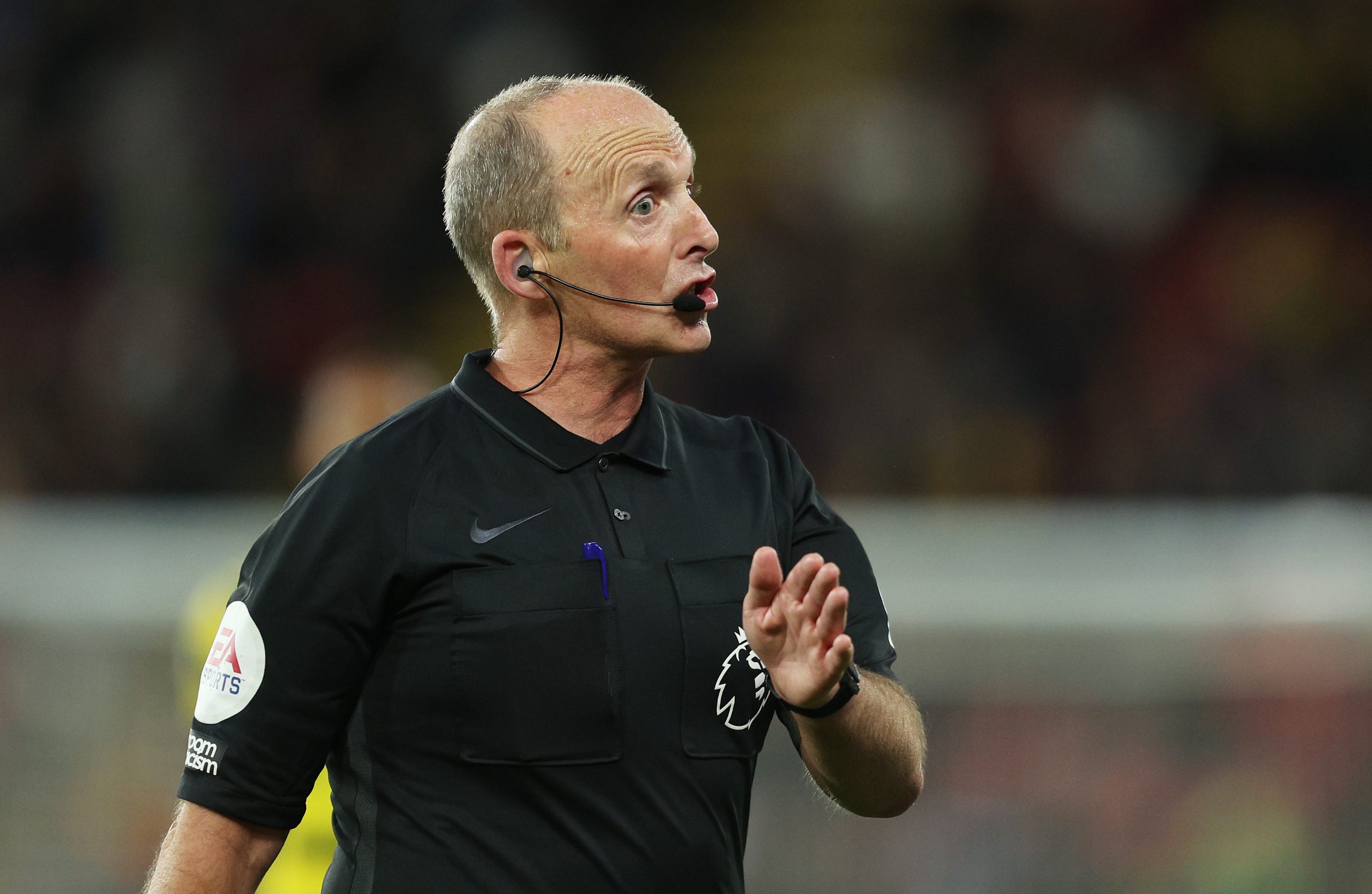 Mike Dean reacts during the Premier League match between Watford and Everton.