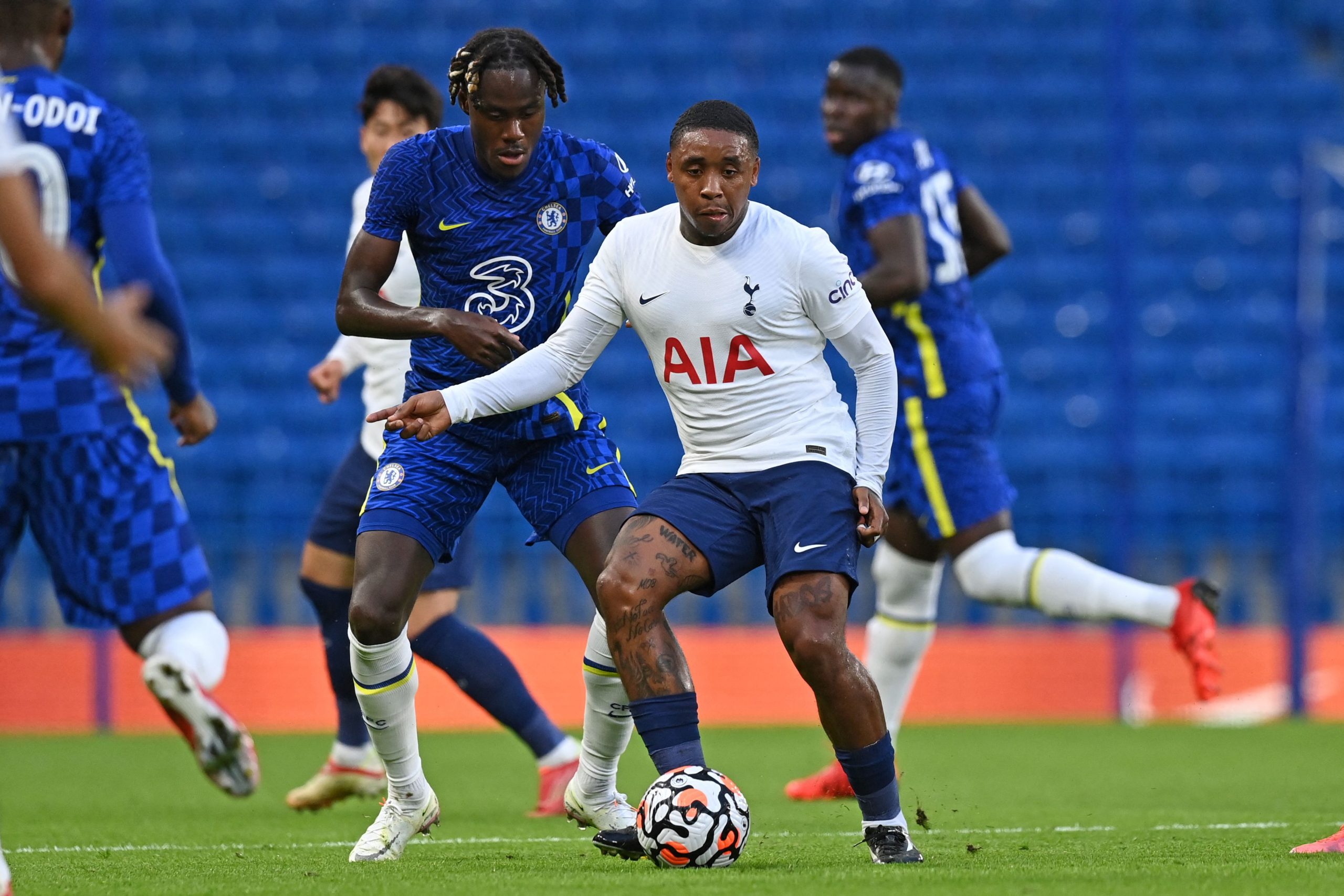 Steven Bergwijn vies with Trevoh Chalobah during a pre-season friendly.