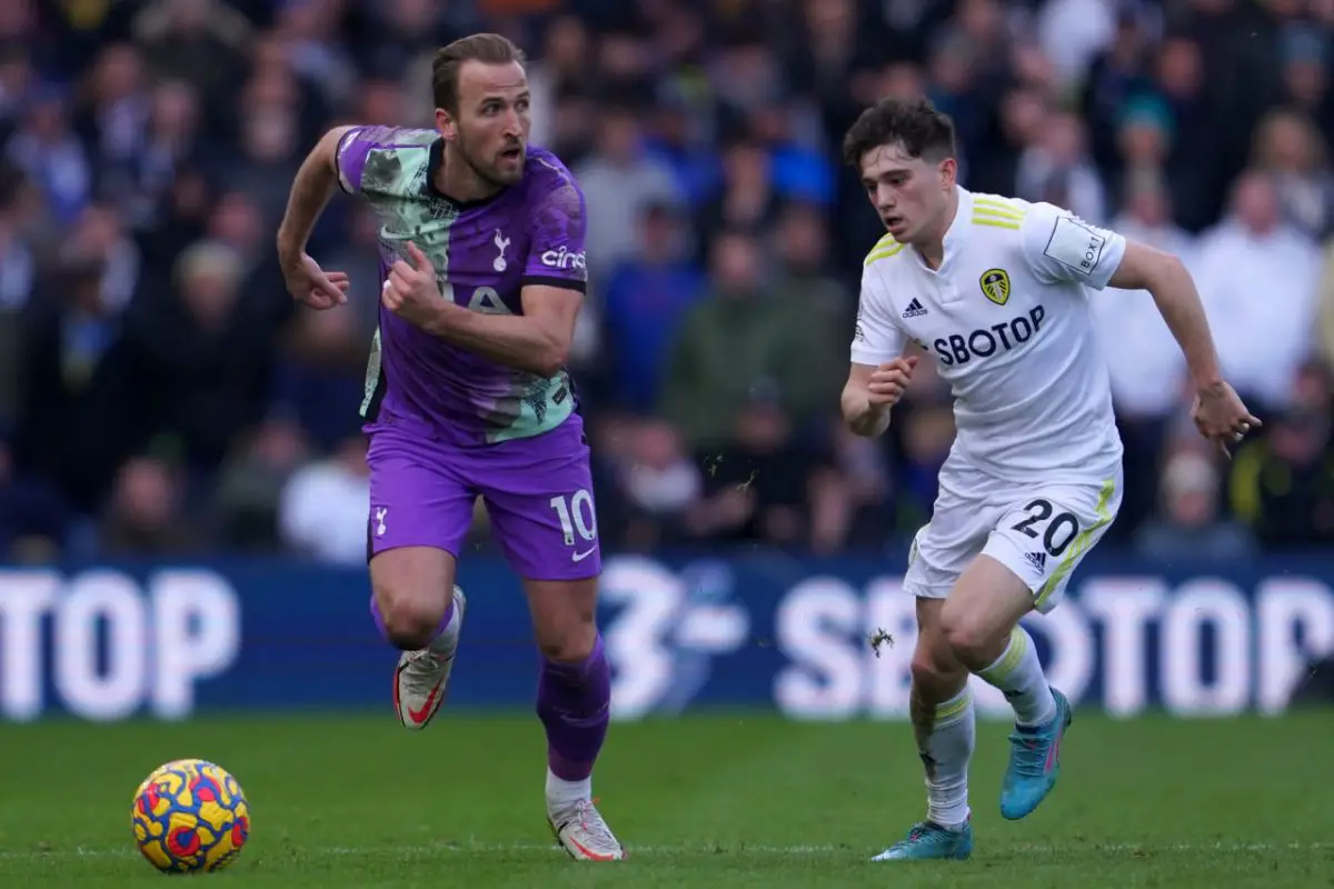 Harry Kane of Spurs with Daniel James of Leeds United. (Photo by JON SUPER/AFP via Getty Images)