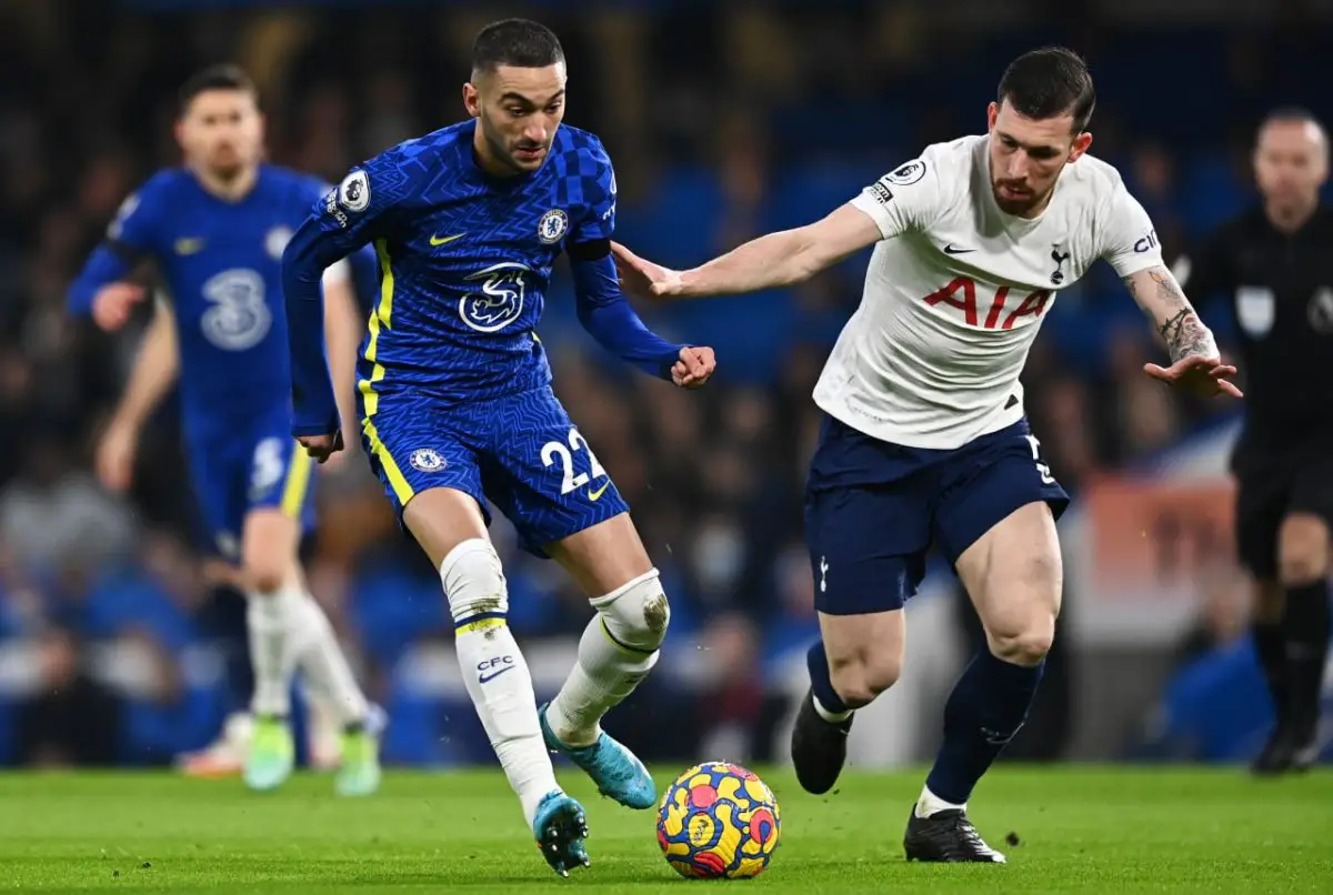 Hakim Ziyech of Chelsea runs with the ball whilst under pressure from Pierre-Emile Hojbjerg of Tottenham Hotspur. 