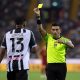 Fabio Maresca shows a yellow card to Destiny Udogie of Udinese Calcio.