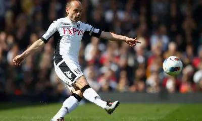 Danny Murphy in action for Fulham against Wigan Athletic in 2012.
