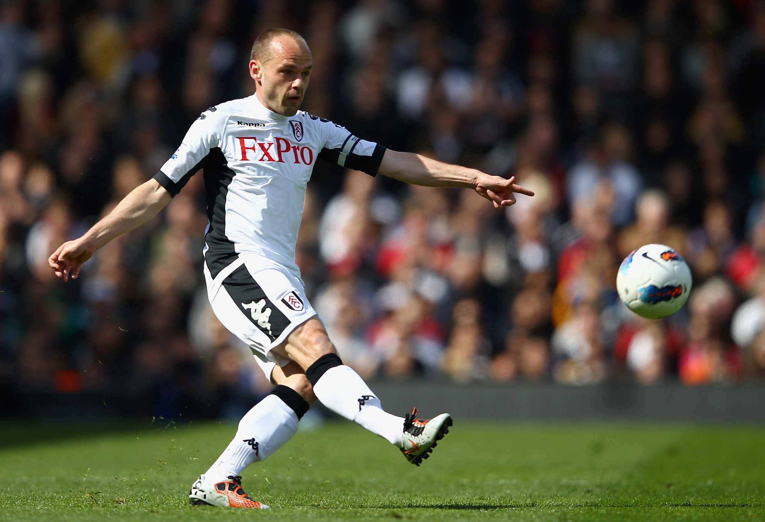 Danny Murphy in action for Fulham against Wigan Athletic in 2012.