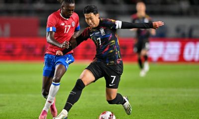 Son Heung-min of South Korea and Tottenham Hotspur battles for possession with Costa Rica's Roan Wilson.