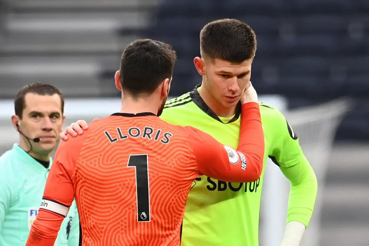 Tottenham Hotspur's Hugo Lloris embraces Leeds United's Illan Meslier.