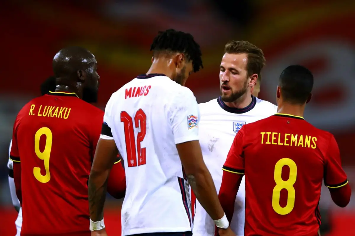 Harry Kane and Romelu Lukaku embrace after England vs Belgium in the UEFA Nations League as Youri Tielemans and Tyrone Mings look on.