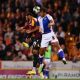 Vadaine Oliver of Bradford City jumps for the ball with Ashley Phillips of Blackburn Rovers during the Carabao Cup Second Round match between Bradford City and Blackburn Rovers at University of Bradford on August 23, 2022 in Bradford, England. (Photo by George Wood/Getty Images)