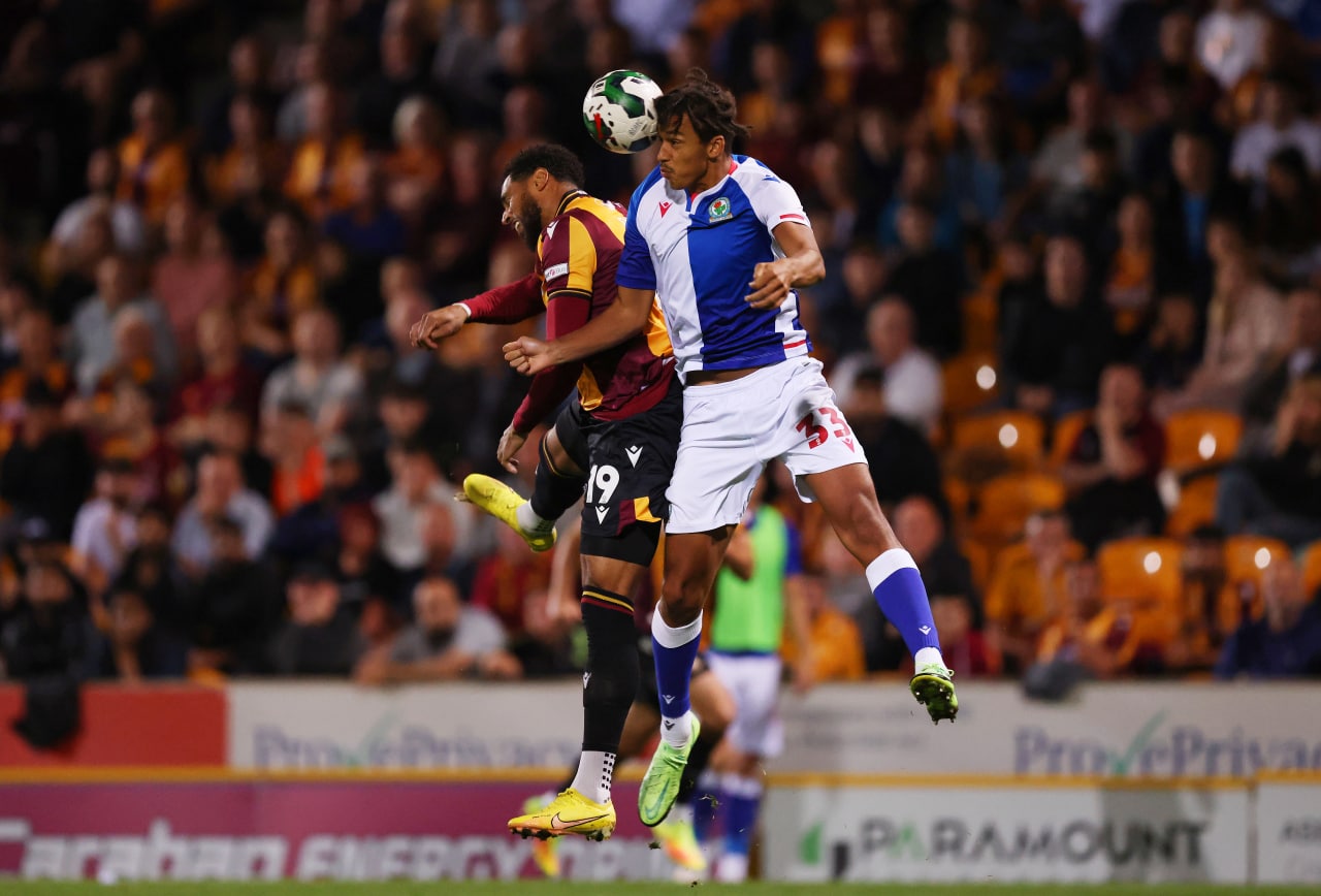 Vadaine Oliver of Bradford City jumps for the ball with Ashley Phillips of Blackburn Rovers during the Carabao Cup Second Round match between Bradford City and Blackburn Rovers at University of Bradford on August 23, 2022 in Bradford, England. (Photo by George Wood/Getty Images)