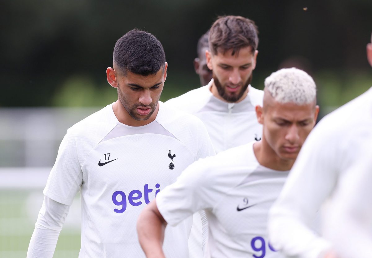 Cristian Romero of Tottenham Hotspur with Richarlison in a training session in Enfield.