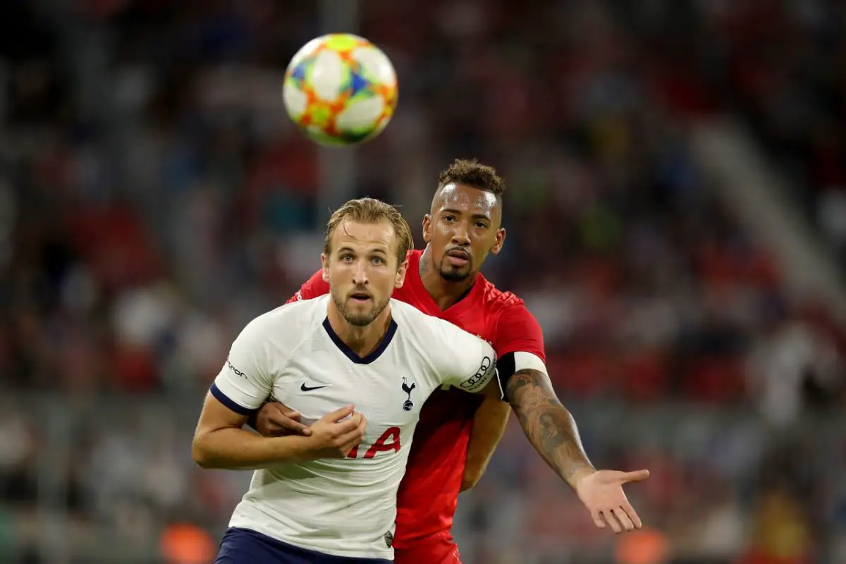 Jerome Boateng of Bayern Munich battles for the ball with Harry Kane of Tottenham. (Photo by Alexander Hassenstein/Getty Images for AUDI)