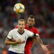 Jerome Boateng of Bayern Munich battles for the ball with Harry Kane of Tottenham. (Photo by Alexander Hassenstein/Getty Images for AUDI)