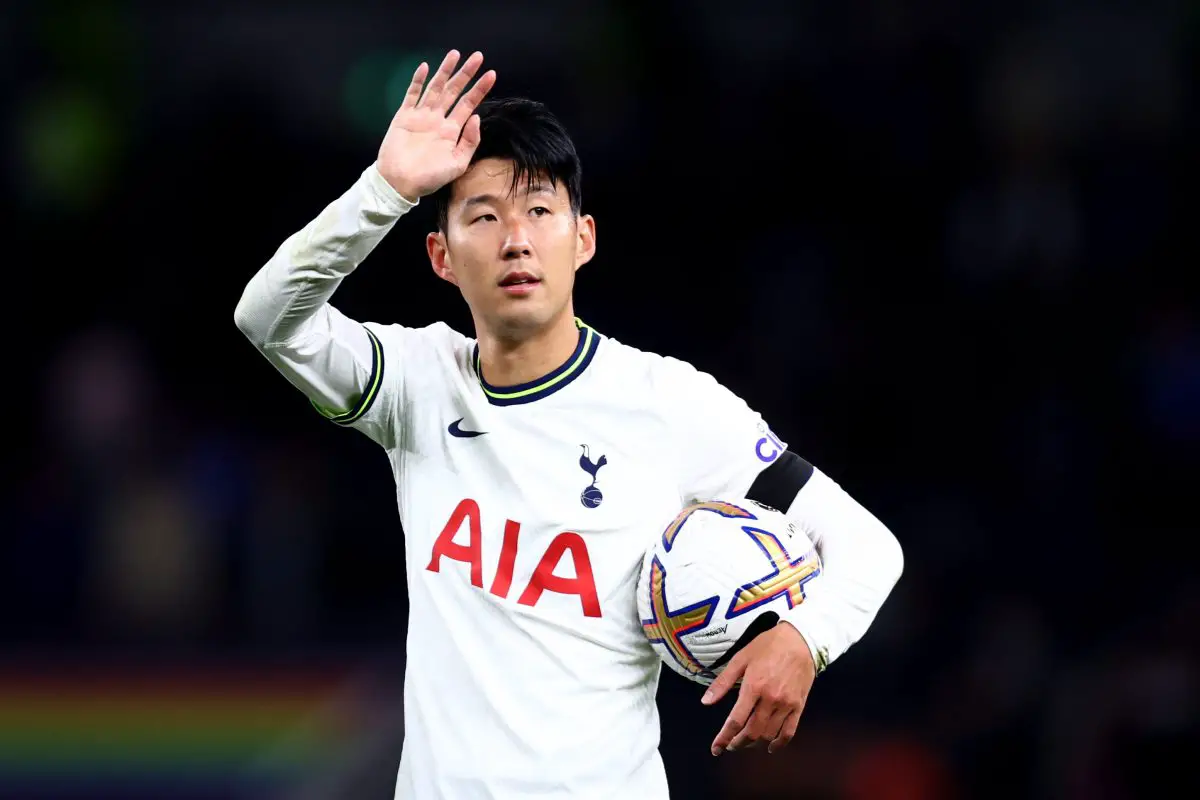 Son Heung-min of Tottenham Hotspur celebrates victory with the match-ball after scoring a hat-trick against Leicester City.