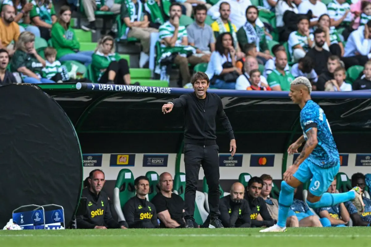 Antonio Conte reacts in front of the Sporting CP dugout as Richarlison runs with the ball for Tottenham Hotspur. 