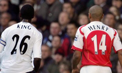 Ledley King and Thierry Henry in action. (Photo by ADRIAN DENNIS/AFP via Getty Images)