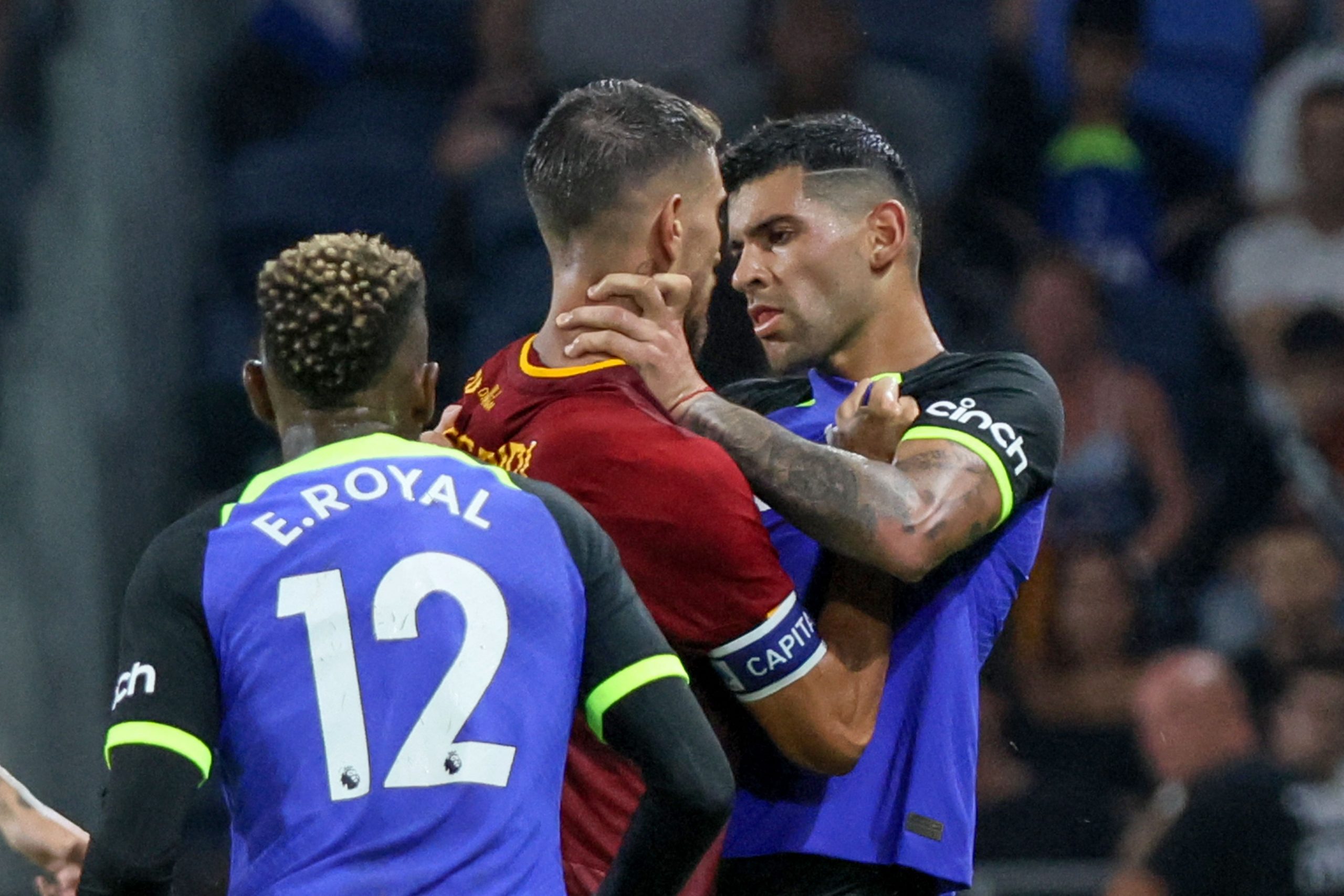Nicolo Zaniolo of AS Roma is confronted by Cristian Romero of Tottenham Hotspur as Emerson Royal watches on.