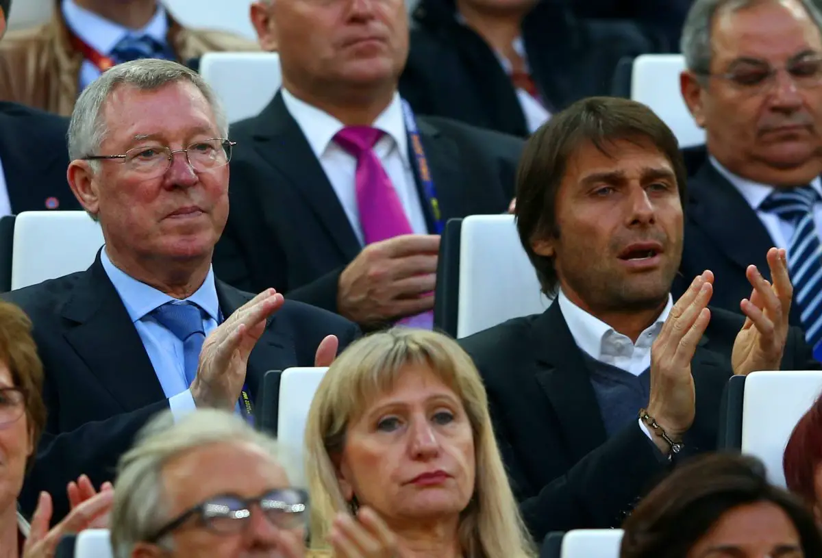 Sir Alex Ferguson with Antonio Conte during a match between SL Benfica and Sevilla.  