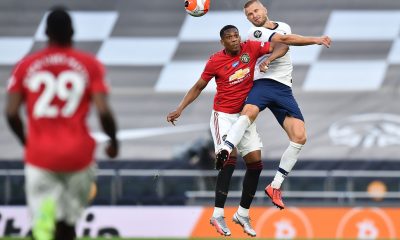 Tottenham Hotspur's Eric Dier challenges Manchester United's Anthony Martial for a header.
