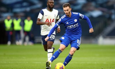 James Maddison of Leicester City on the ball whilst under pressure from Tanguy Ndombele of Tottenham Hotspur.