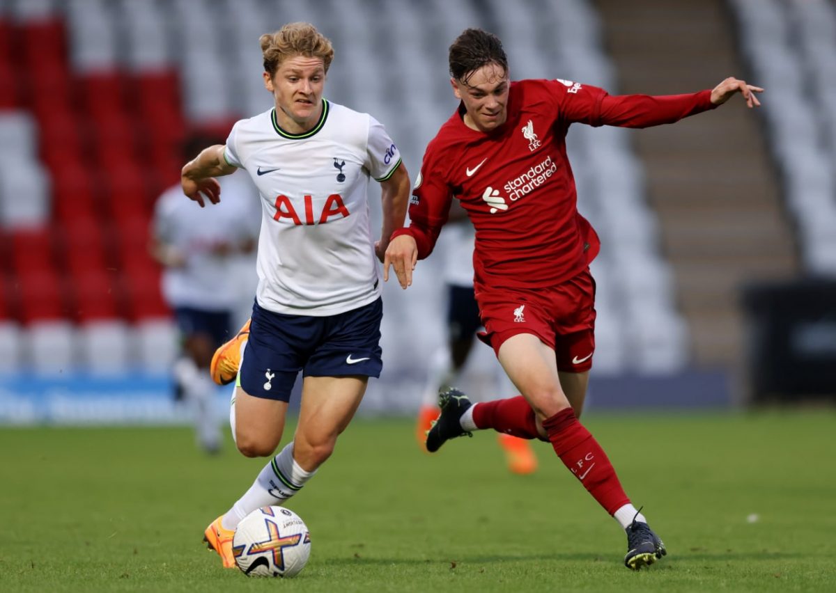 Matthew Craig of Tottenham Hotspur and Luke Chambers of Liverpool battle for the ball during a Premier League 2 match.