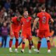 Mason Mount of England celebrates with teammate Eric Dier after scoring against Germany.