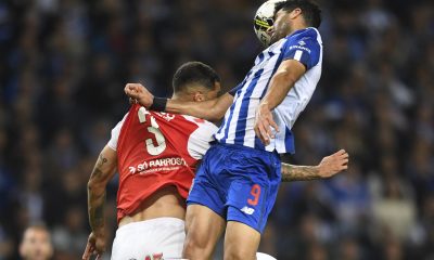 FC Porto's Mehdi Taremi heads the ball as he vies with Sporting Braga's Vitor Tormena in a game that finished 4-1 for the Dragons.