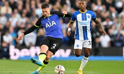 Tottenham Hotspur's Matt Doherty passes the ball as Brighton's Pervis Estupinan looks on during a match in October 2022. (Photo by GLYN KIRK/AFP via Getty Images)